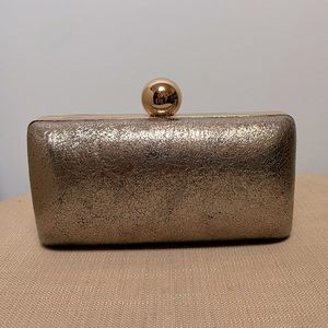 Milly silver and gold clutch